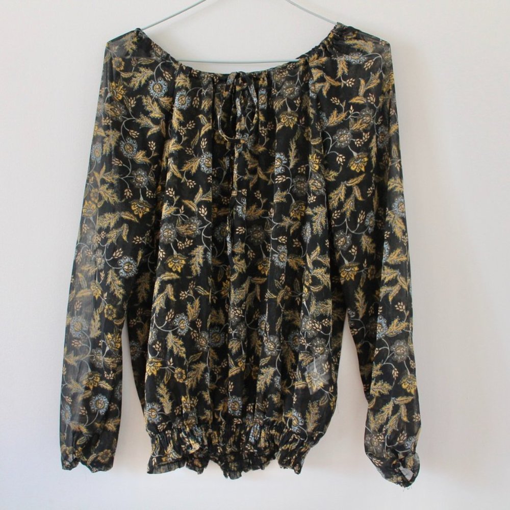 Slightly transparent flowery shirt